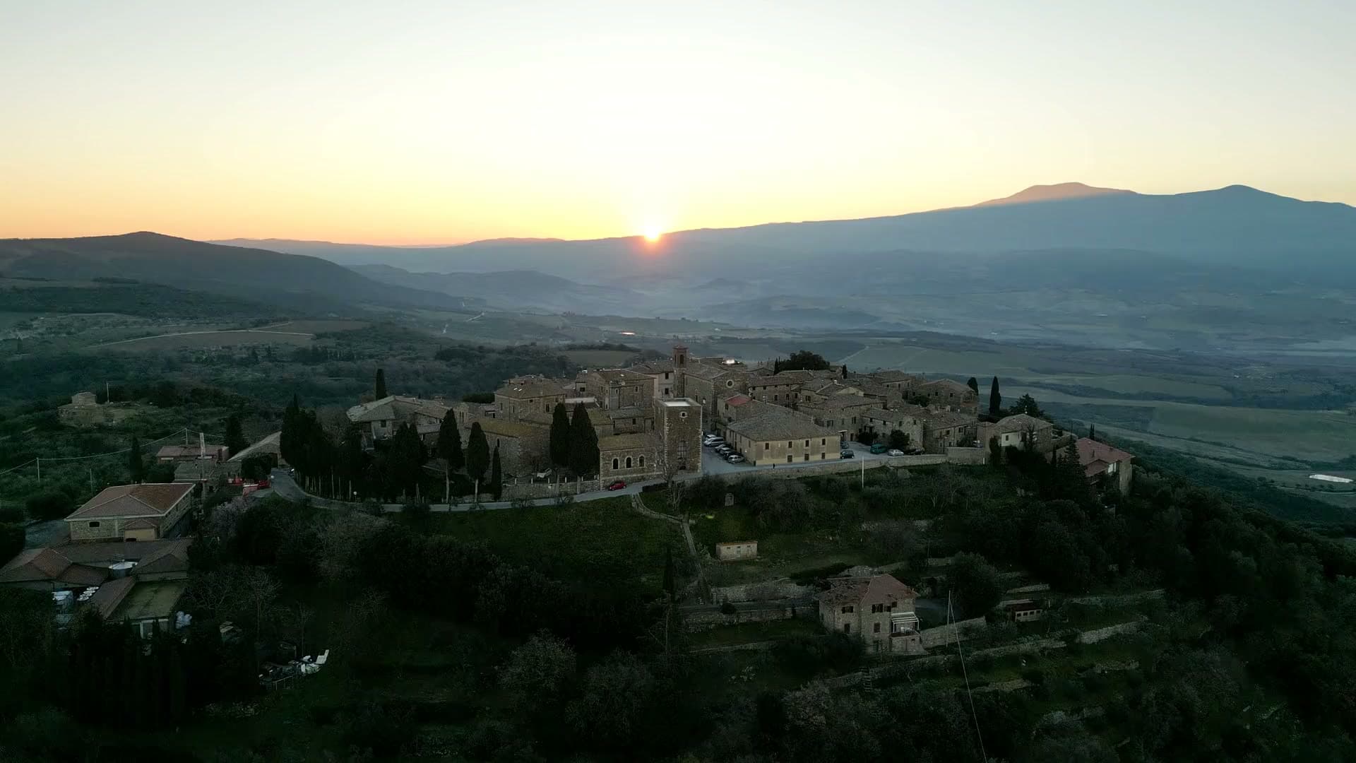 Sunrise over the Val d'Orcia countryside, seen from Sant'Angelo in Colle